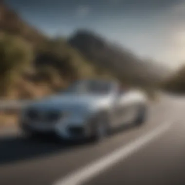 Mercedes E350 Convertible in motion on a scenic road