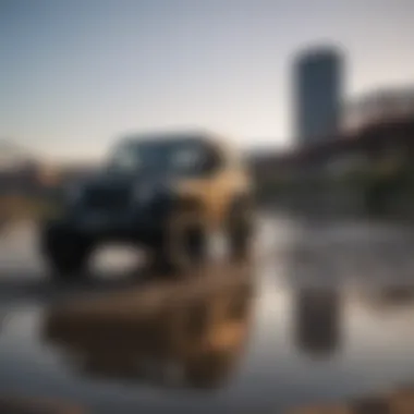 A picturesque view of Little Rock with a Jeep Wrangler parked by the riverfront.