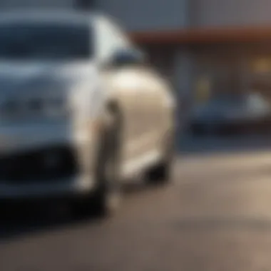 A close-up of a budget-friendly used car on display at a dealership